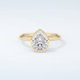 1.25 CT Pear Cut Bezel Style Moissanite Engagement Ring 1