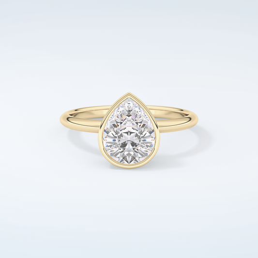 1.25 CT Pear Cut Bezel Style Moissanite Engagement Ring