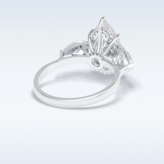 Elegant 1.29 CT Three Stone & Hidden Halo Engagement Ring Featuring Pear Moissanite