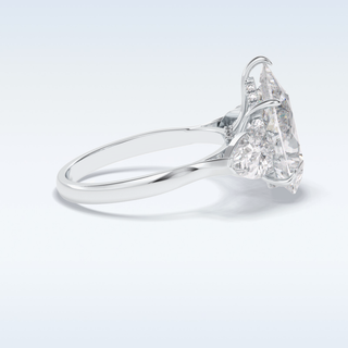 Elegant 1.29 CT Three Stone & Hidden Halo Engagement Ring Featuring Pear Moissanite