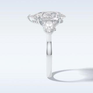 Elegant 1.29 CT Three Stone & Hidden Halo Engagement Ring Featuring Pear Moissanite