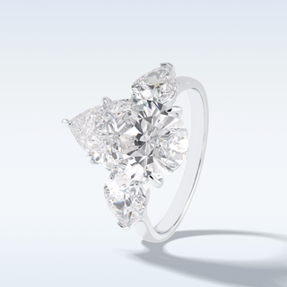 Elegant 1.29 CT Three Stone & Hidden Halo Engagement Ring Featuring Pear Moissanite