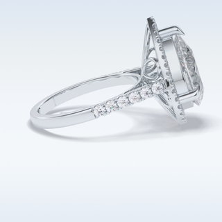 Elegant 3.0 CT Halo & Pave Engagement Ring Featuring Pear Moissanite