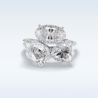 Elegant 5.98 CT Three Stone Engagement Ring Featuring Oval, Pear & Heart Moissanite 1