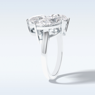 Elegant 5.98 CT Three Stone Engagement Ring Featuring Oval, Pear & Heart Moissanite 5