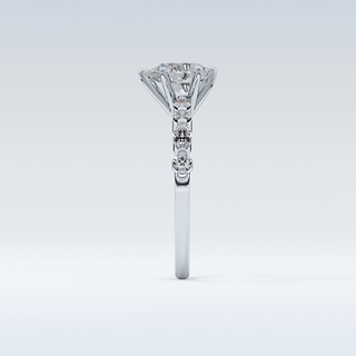 0.93 CT Pave Engagement Ring Featuring Pear Moissanite