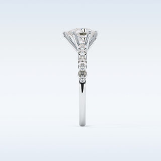 0.93 CT Pave Engagement Ring Featuring Pear Moissanite