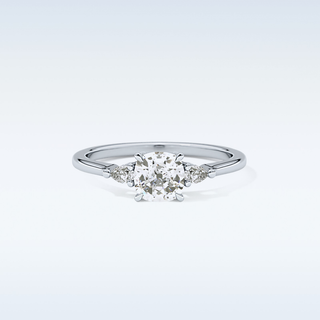 Elegant 0.95 CT Three Stones Engagement Ring Featuring Cushion Moissanite