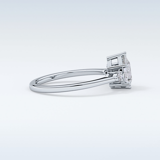 Elegant 0.86 CT Three Stones Engagement Ring Featuring Pear Moissanite