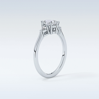 Elegant 0.86 CT Three Stones Engagement Ring Featuring Pear Moissanite