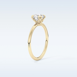 1.03 CT Solitaire & Double Prongs Engagement Ring Featuring Round Moissanite