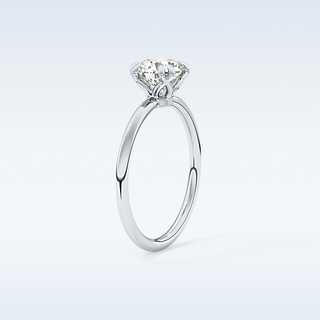 1.03 CT Solitaire & Double Prongs Engagement Ring Featuring Round Moissanite