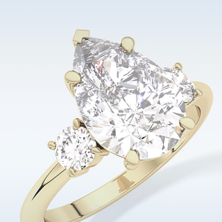 Elegant 2.84 CT Three Stones Engagement Ring Featuring Pear Moissanite