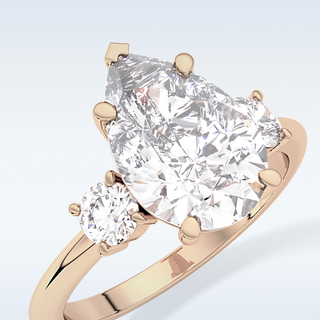 Elegant 2.84 CT Three Stones Engagement Ring Featuring Pear Moissanite