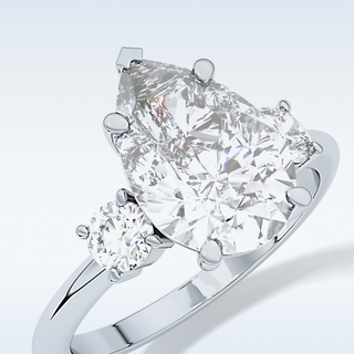 Elegant 2.84 CT Three Stones Engagement Ring Featuring Pear Moissanite