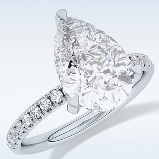 2.84 CT Hidden Halo & Pave Engagement Ring Featuring Pear Moissanite