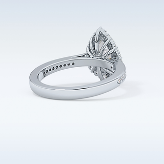 1.2 CT Halo & Pave Engagement Ring Featuring Pear Moissanite