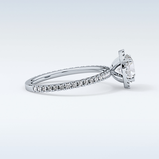 Elegant 0.72 CT Halo & Pave Engagement Ring Featuring Round Moissanite