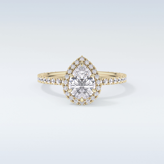 Elegant 0.86 CT Halo & Pave Engagement Ring Featuring Pear Moissanite