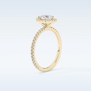 Elegant 0.86 CT Halo & Pave Engagement Ring Featuring Pear Moissanite