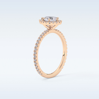 Elegant 0.86 CT Halo & Pave Engagement Ring Featuring Pear Moissanite