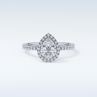 Elegant 0.86 CT Halo & Pave Engagement Ring Featuring Pear Moissanite
