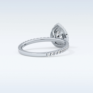Elegant 0.86 CT Halo & Pave Engagement Ring Featuring Pear Moissanite