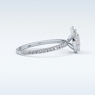 Elegant 0.86 CT Halo & Pave Engagement Ring Featuring Pear Moissanite