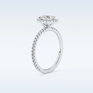 Elegant 0.86 CT Halo & Pave Engagement Ring Featuring Pear Moissanite