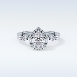 0.65 CT Halo & Pave Engagement Ring Featuring Pear Moissanite