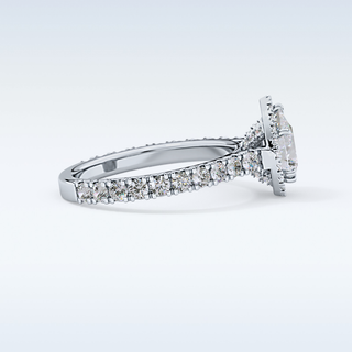 0.65 CT Halo & Pave Engagement Ring Featuring Pear Moissanite