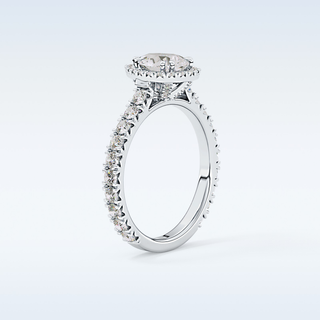 0.65 CT Halo & Pave Engagement Ring Featuring Pear Moissanite