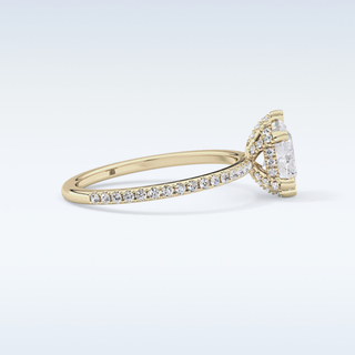 0.86 CT Hidden Halo & Pave Engagement Ring Featuring Pear Moissanite