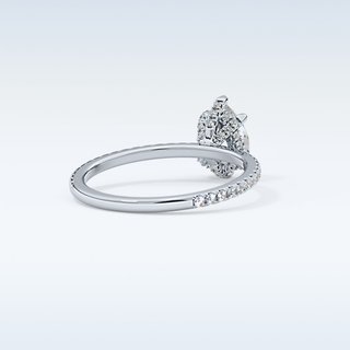 0.86 CT Hidden Halo & Pave Engagement Ring Featuring Pear Moissanite