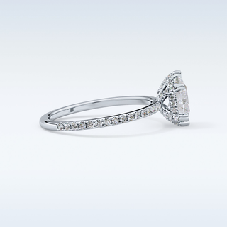 0.86 CT Hidden Halo & Pave Engagement Ring Featuring Pear Moissanite