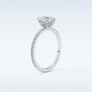 0.86 CT Hidden Halo & Pave Engagement Ring Featuring Pear Moissanite