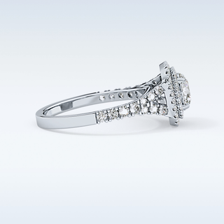 0.79 CT Double Halo & Pave Engagement Ring Featuring Round Moissanite