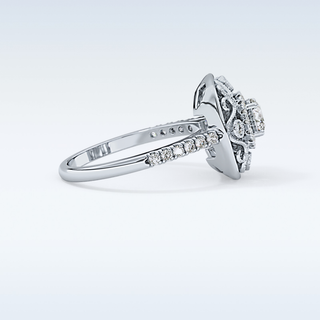0.32 CT Halo Engagement Ring Featuring Round Moissanite