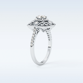 0.32 CT Halo Engagement Ring Featuring Round Moissanite