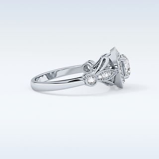 0.67 CT Halo & Pave Engagement Ring Featuring Round Moissanite