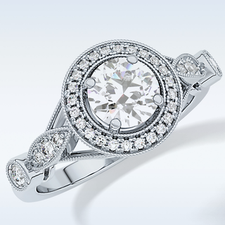 0.67 CT Halo & Pave Engagement Ring Featuring Round Moissanite