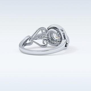 0.67 CT Halo & Pave Engagement Ring Featuring Round Moissanite