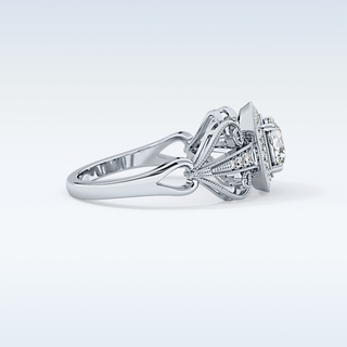 0.67 CT Halo & Pave Engagement Ring Featuring Round Moissanite