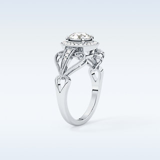 0.67 CT Halo & Pave Engagement Ring Featuring Round Moissanite