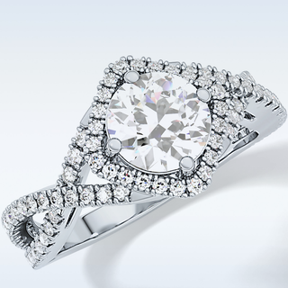 0.95 CT Halo & Twig Engagement Ring Featuring Round Moissanite