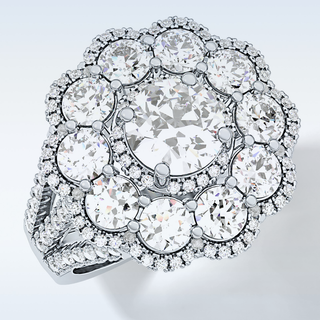 1.13 CT Cluster Engagement Ring Featuring Round Moissanite
