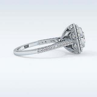 0.84 CT Halo & Pave Engagement Ring Featuring Round Moissanite