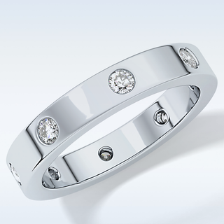 Beautiful Dainty Wedding Band with 0.59 CT Round Cut Moissanite
