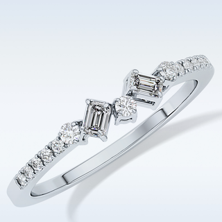 Beautiful Multi Stone Wedding Band with 0.3 CT Round & Emerald Cut Moissanite