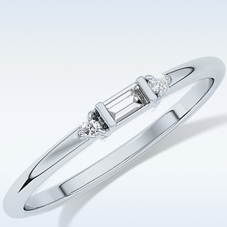 Beautiful Three Stones Wedding Band with 0.097 CT Round & Baguette Cut Moissanite
